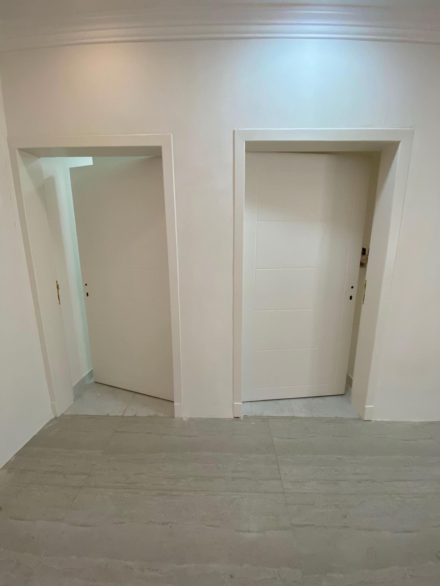 معلم دهان ابواب خشب بالرياض